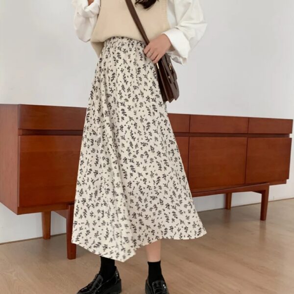 Jupe midi imprimée taille haute évasée romantique